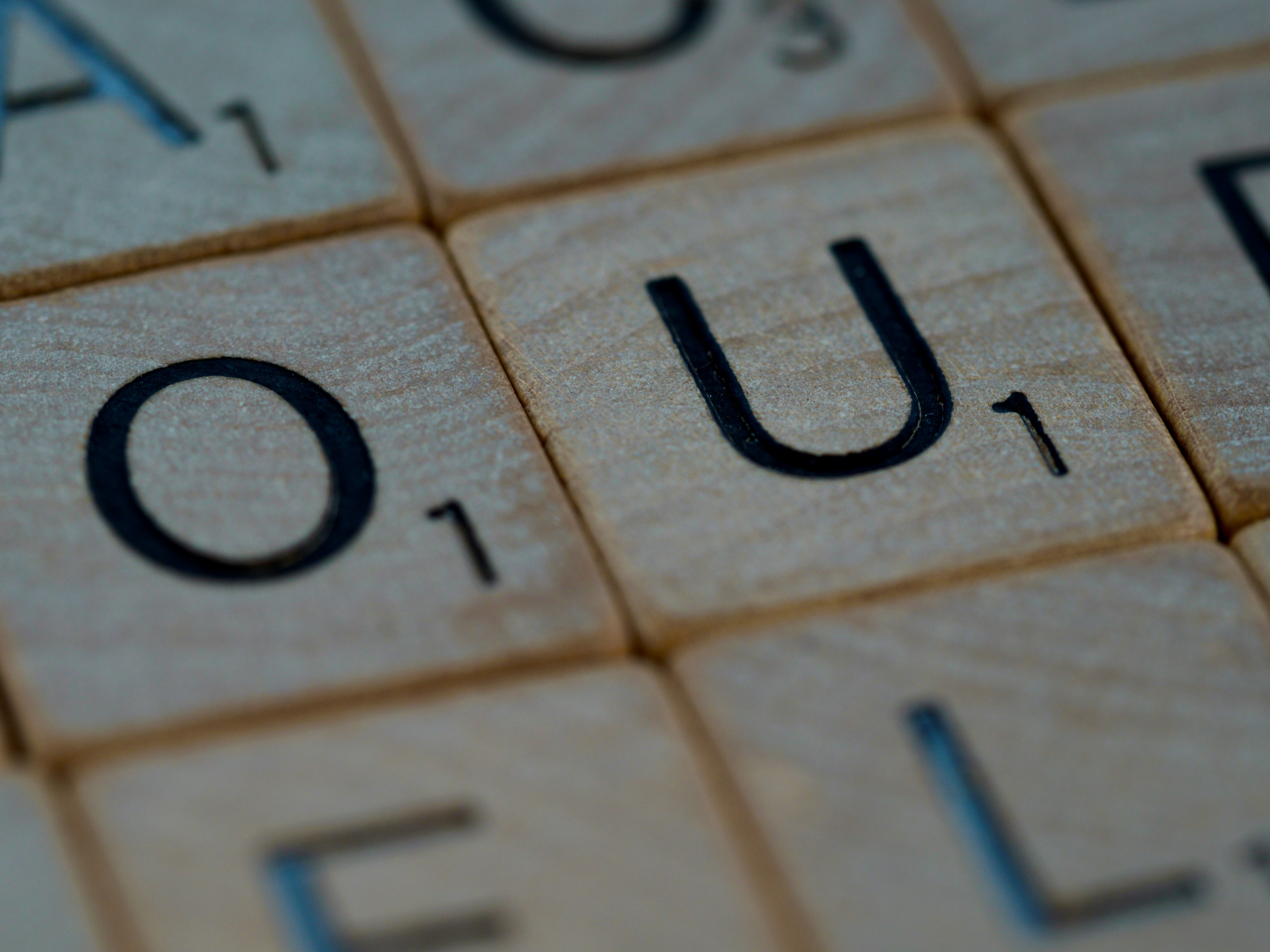 scrabble, scrabble pieces, lettering, letters, wood, scrabble tiles, white background, words, quote, letters, type, typography, design, layout, focus, bokeh, blur, photography, images, image,