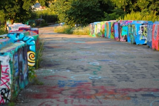 An artistic image of a decorative concrete pathway lined with plants.