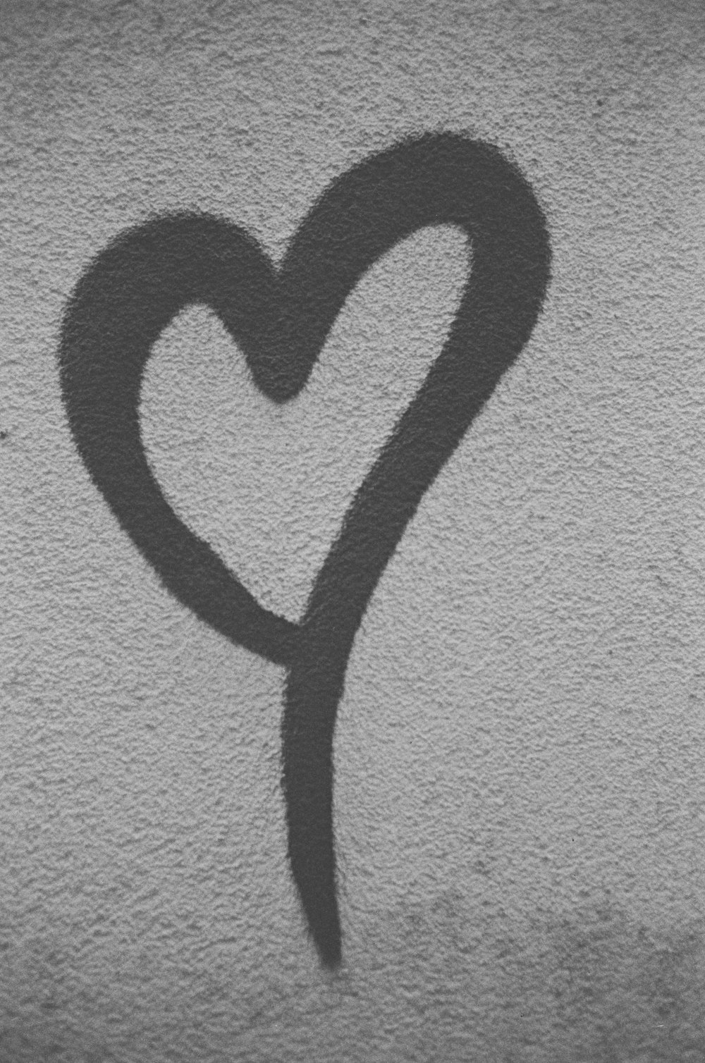 black metal chain on white wall