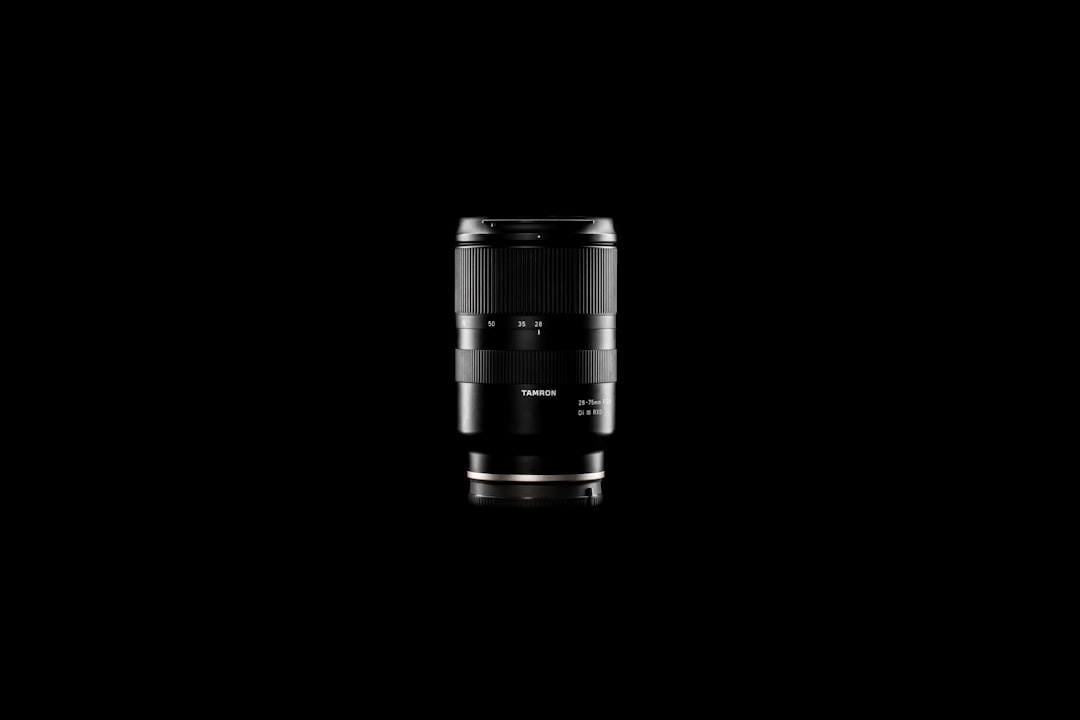 black camera lens on white background