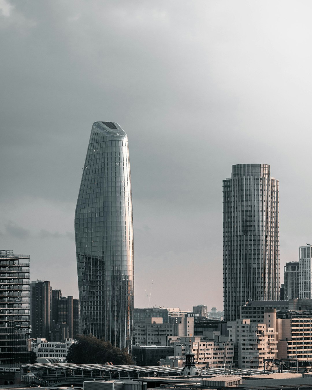 city skyline under gray sky during daytime