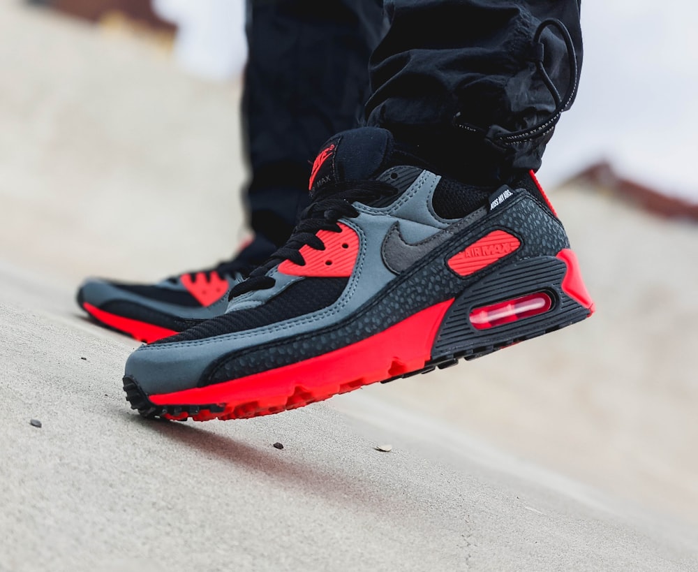 black and red nike air max 90 shoes photo – Free Image on Unsplash