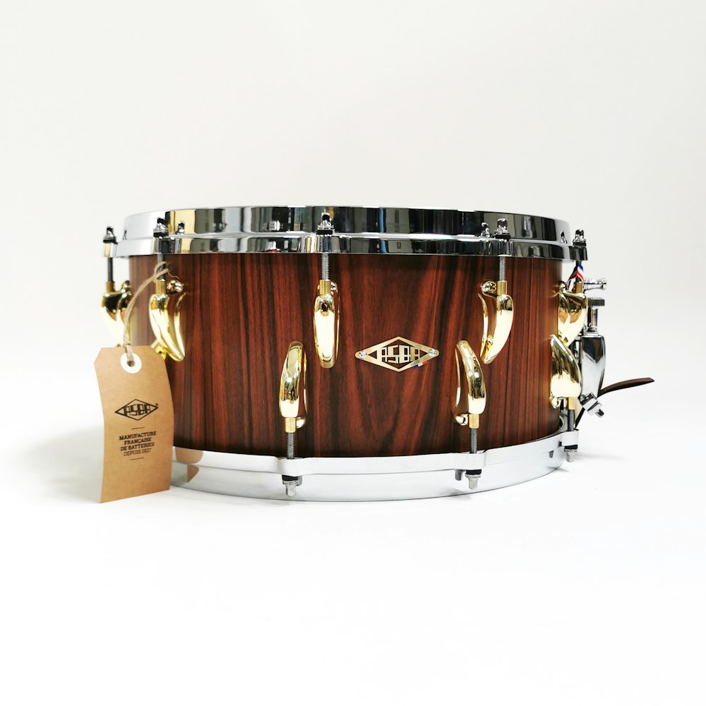 brown and black drum set