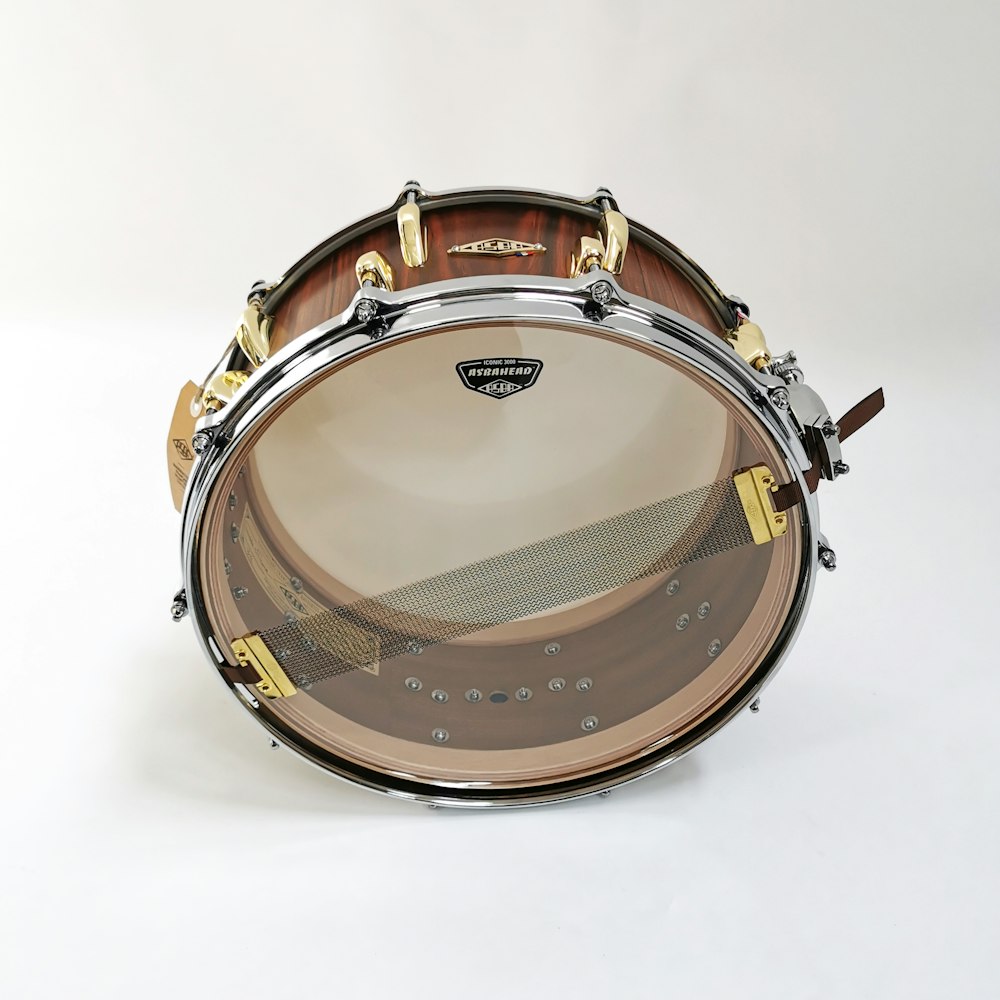 brown and black drum set