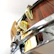 Before and after images of a restored vintage drum showing detailed craftsmanship.
