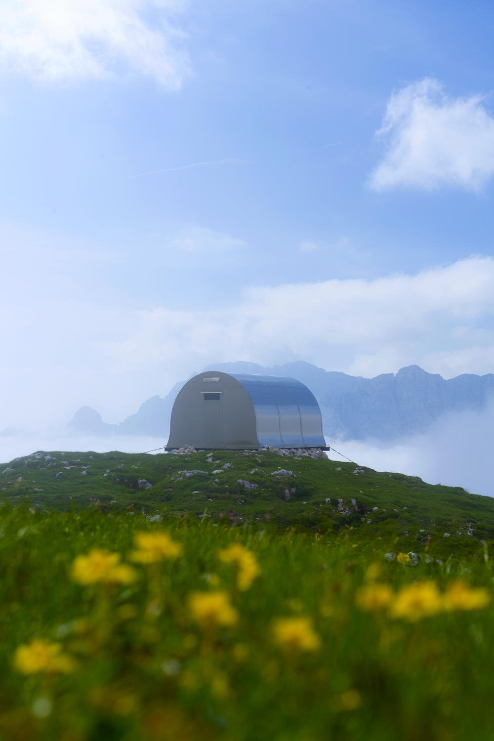 white dome tent on green grass field during daytime