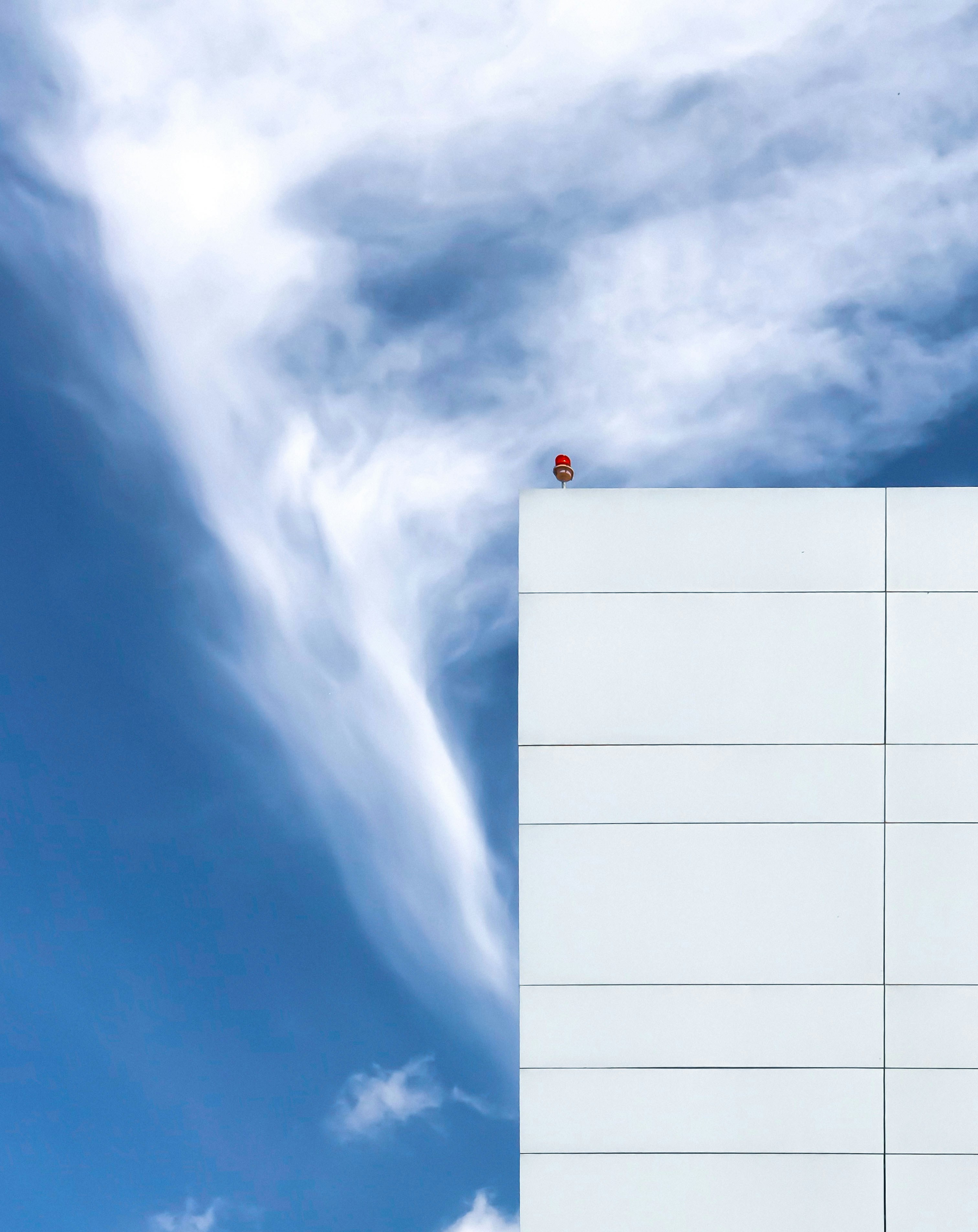 white concrete building under blue sky