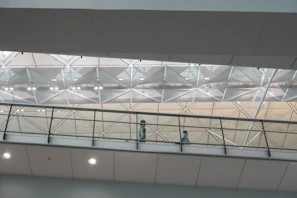 A VR headset perspective of a virtual architectural walkthrough in a minimalist space.