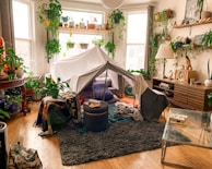 A domo chillout tent filled with plants and ambient lighting.