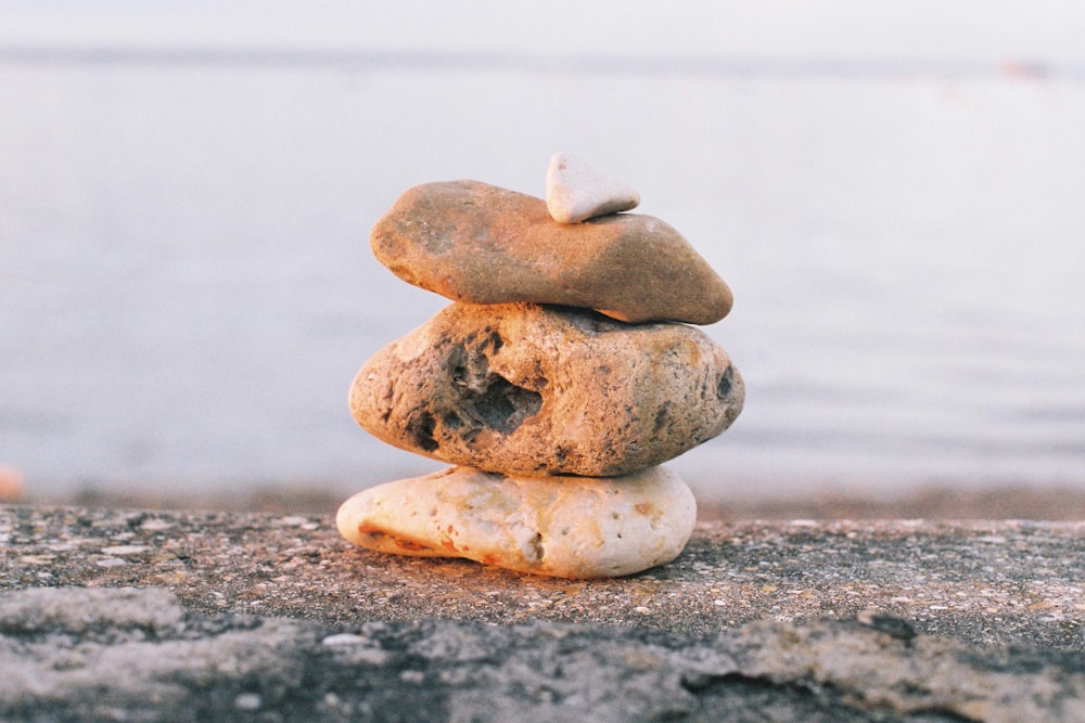 gray stone stack on gray sand