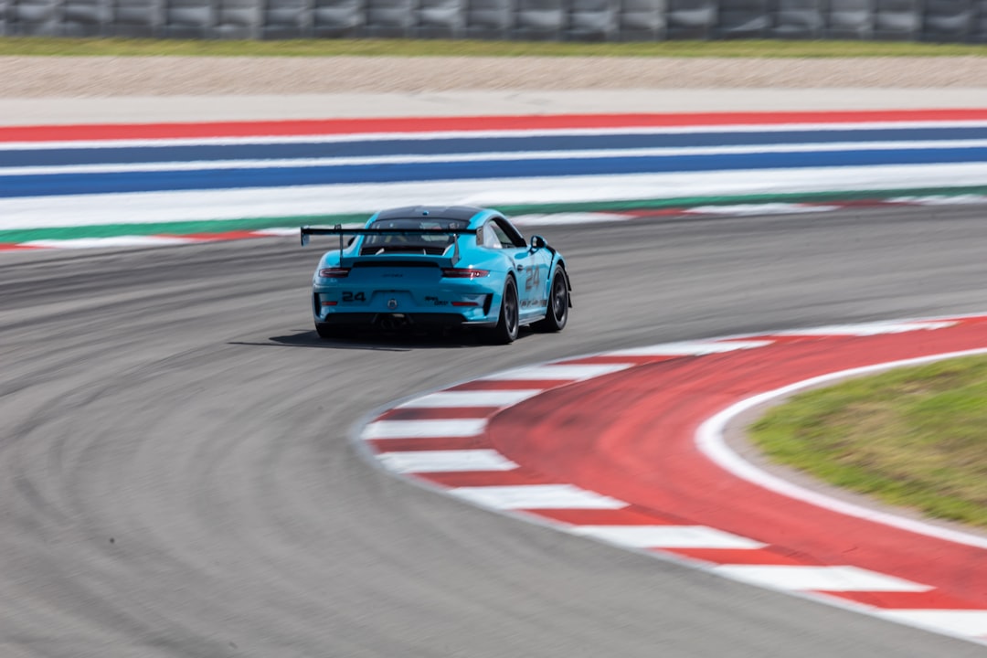 blue porsche 911 on track