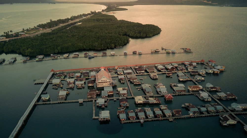 aerial view of city buildings near body of water during daytime