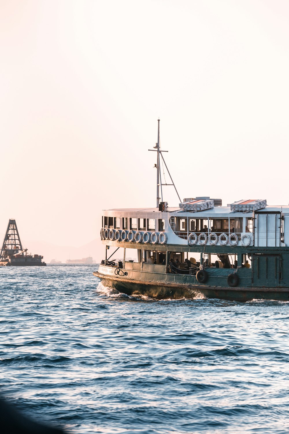 white and brown ship on sea during daytime