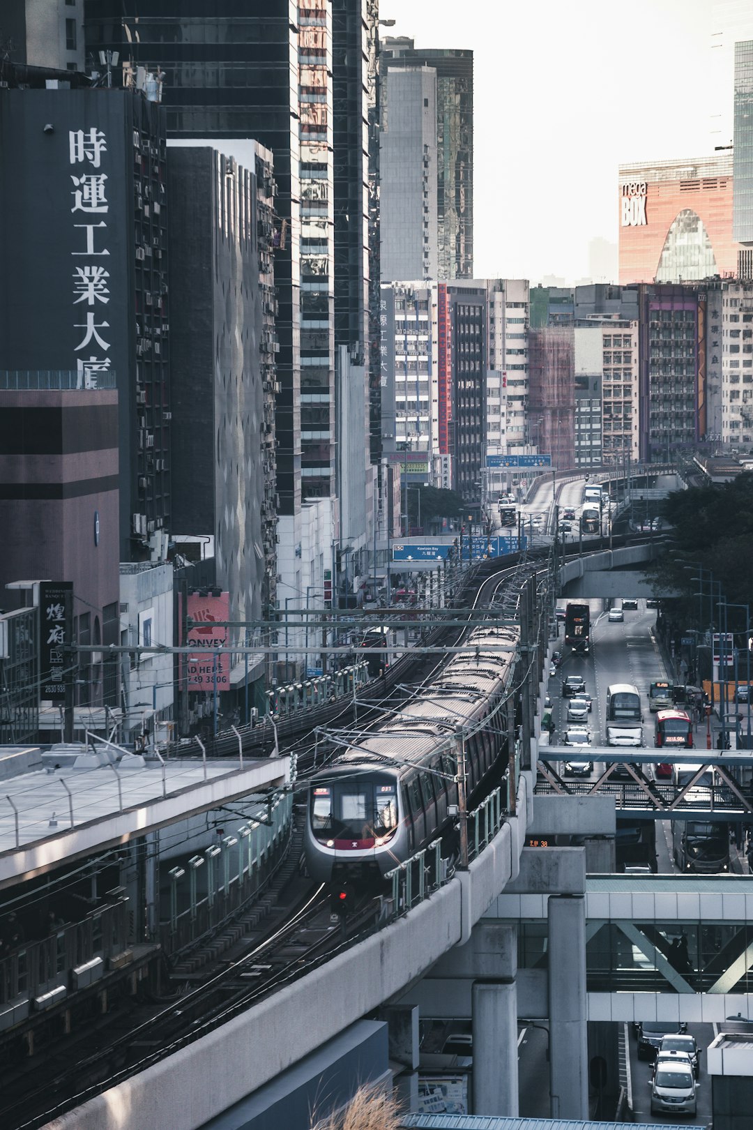 white and black train on rail road during daytime