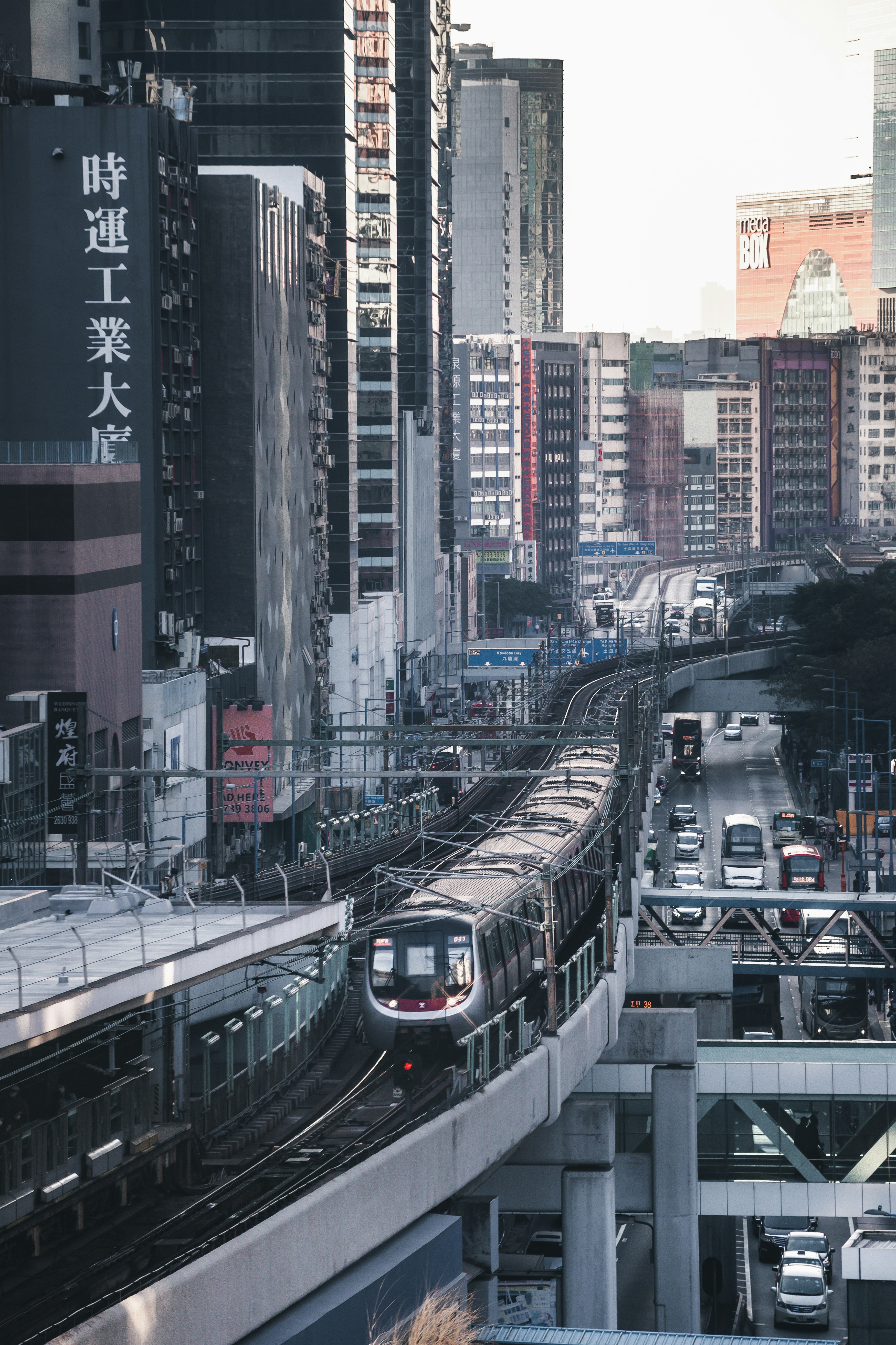 white and black train on rail road during daytime