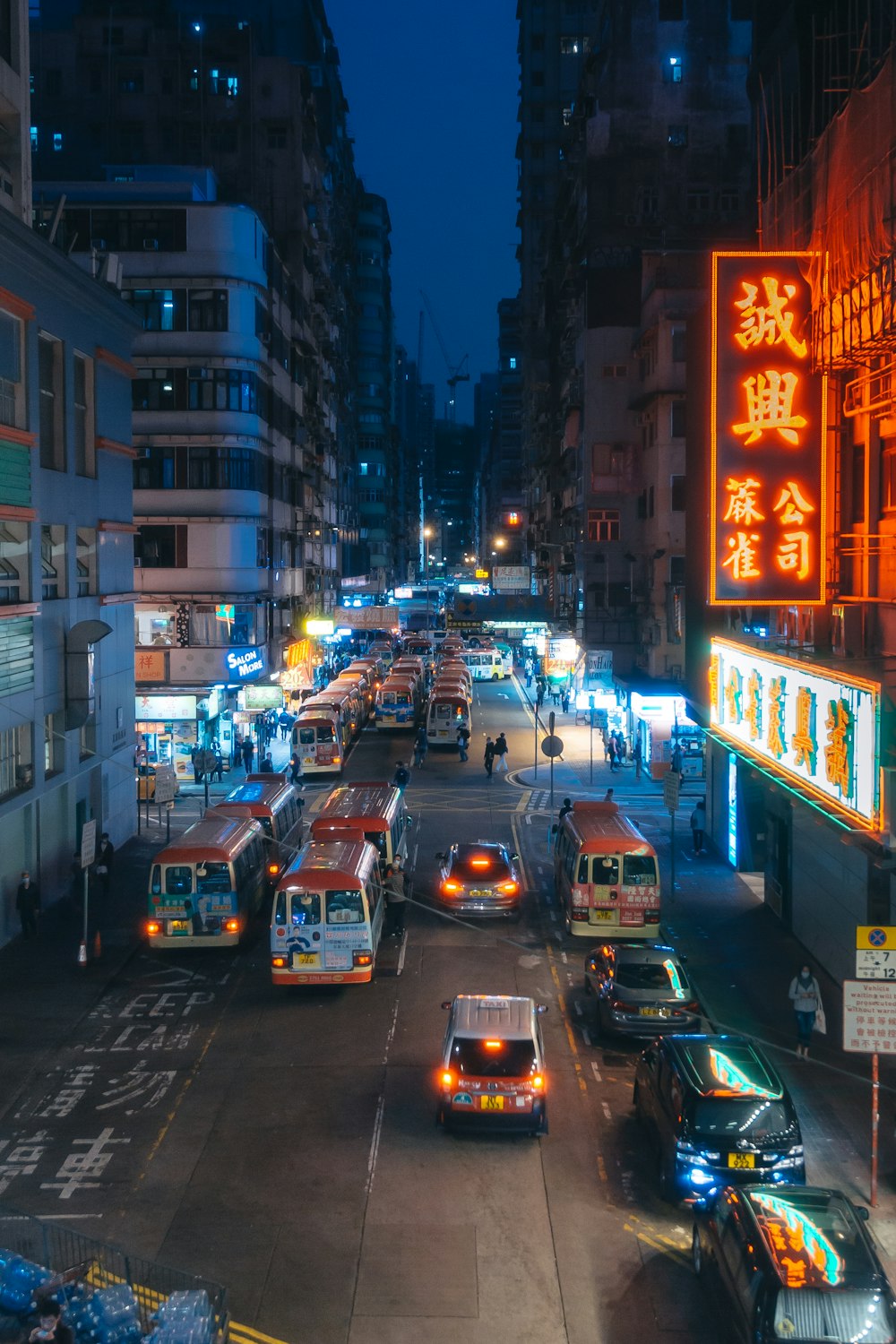 cars on road in city during night time