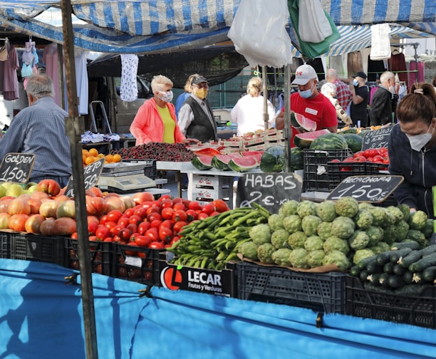 people in market during daytime