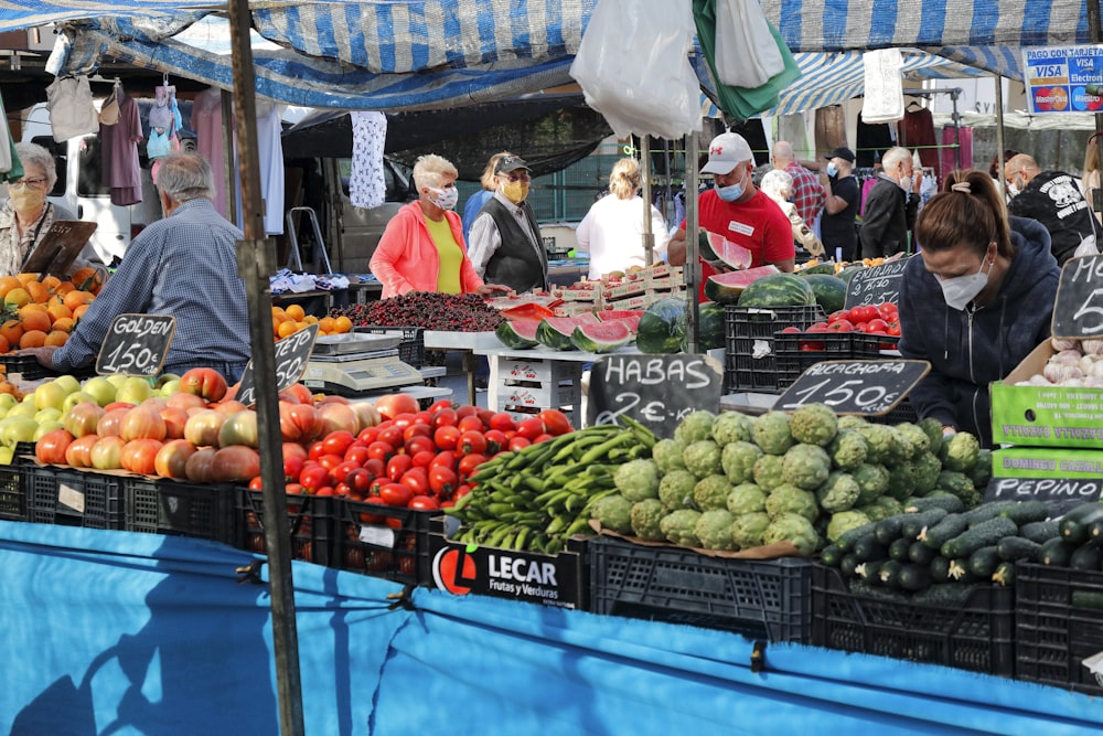 people in market during daytime