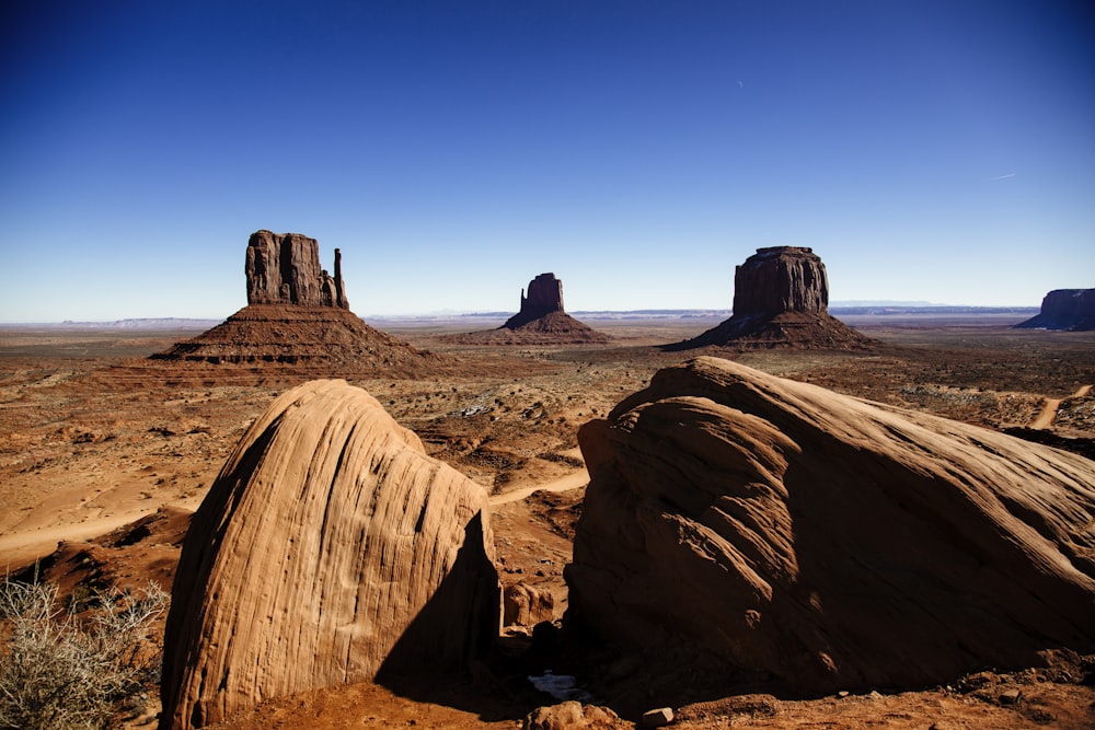 brown rock formation under blue sky during daytime