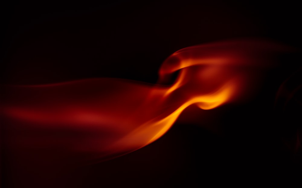 red flame in dark room
