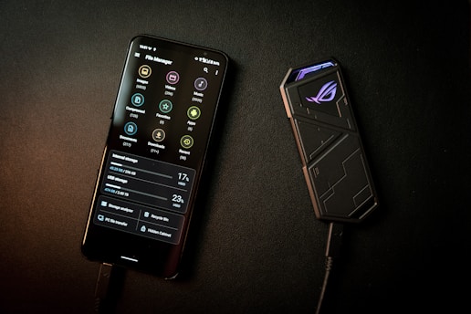 black remote control on black textile