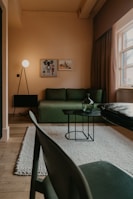 Cozy living room featuring new flooring and subtle, warm lighting.