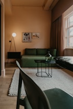 A cozy apartment living room with warm lighting and inviting furniture.