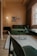 A cozy living room illuminated by a stylish lamp from lumecraft.click.
