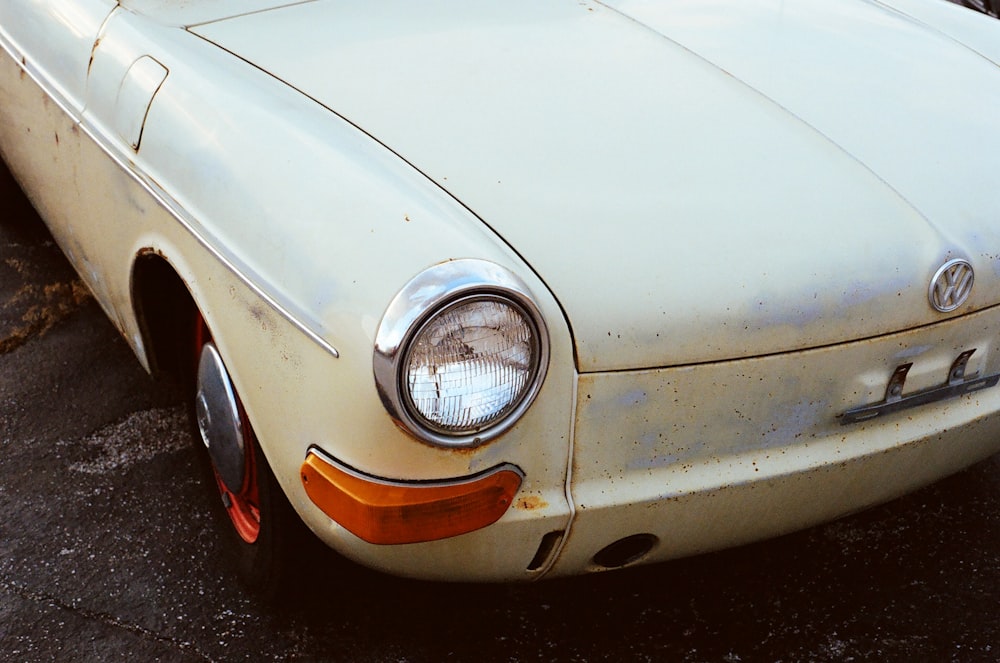 white car on black asphalt road