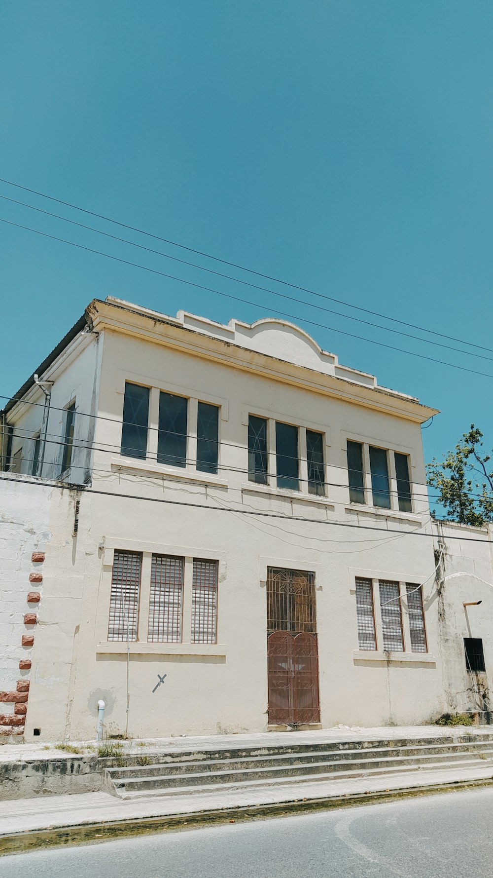 white concrete building under blue sky during daytime