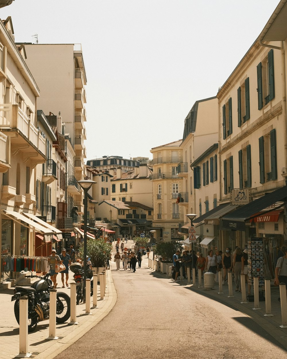 people walking on street near buildings during daytime