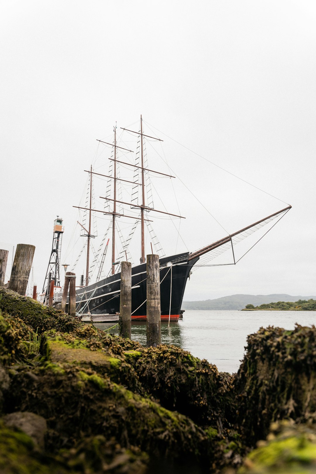 brown and black ship on sea during daytime