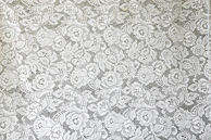white and black floral textile