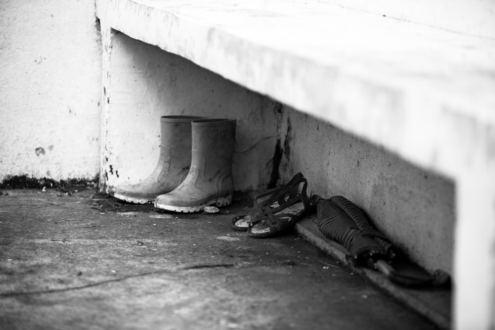 black and white boots on the floor