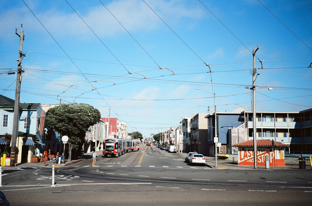 cars on road near buildings during daytime