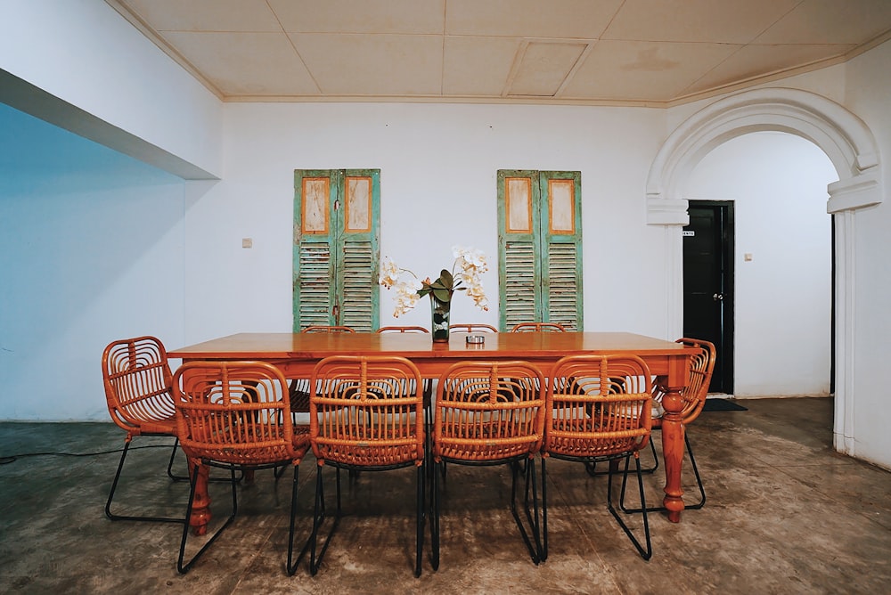 brown wooden table and chairs