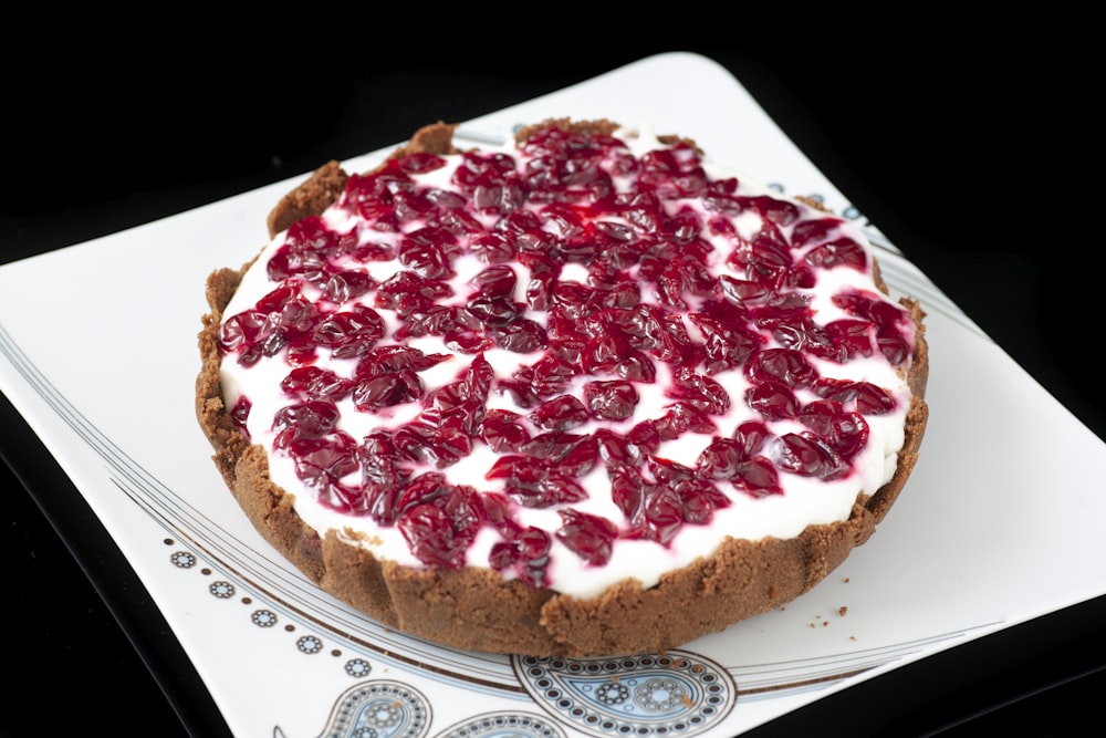 strawberry pie on white ceramic plate