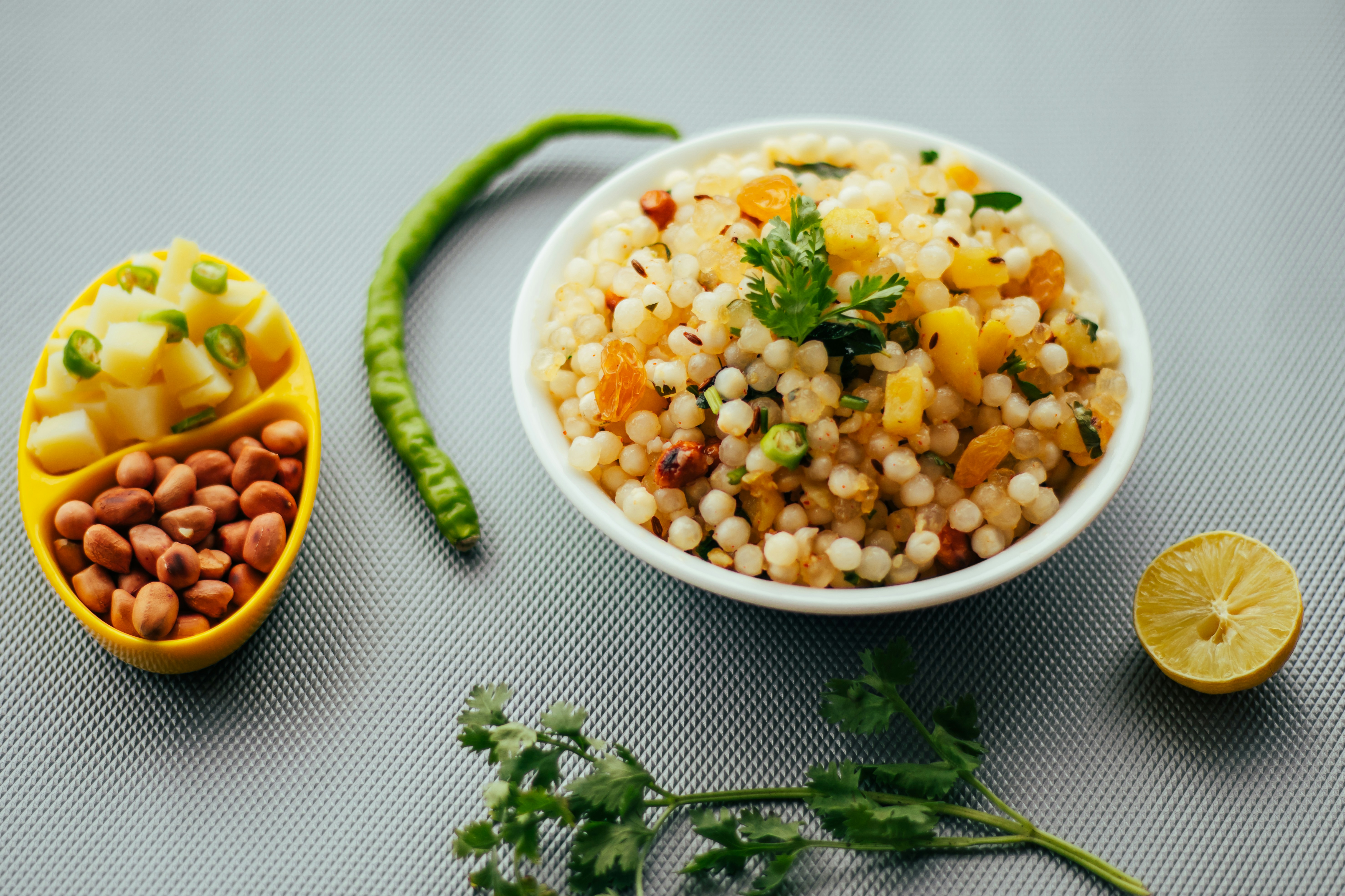 Sabudana khichdi tapioca pearls dish with peanuts on banana leaf
