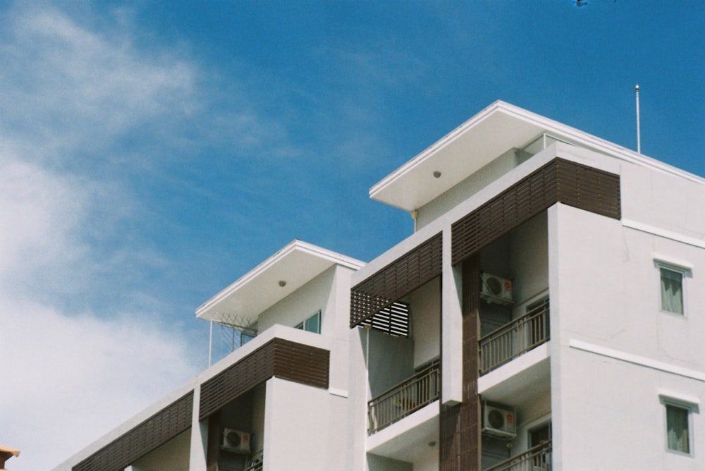 white concrete building under blue sky during daytime