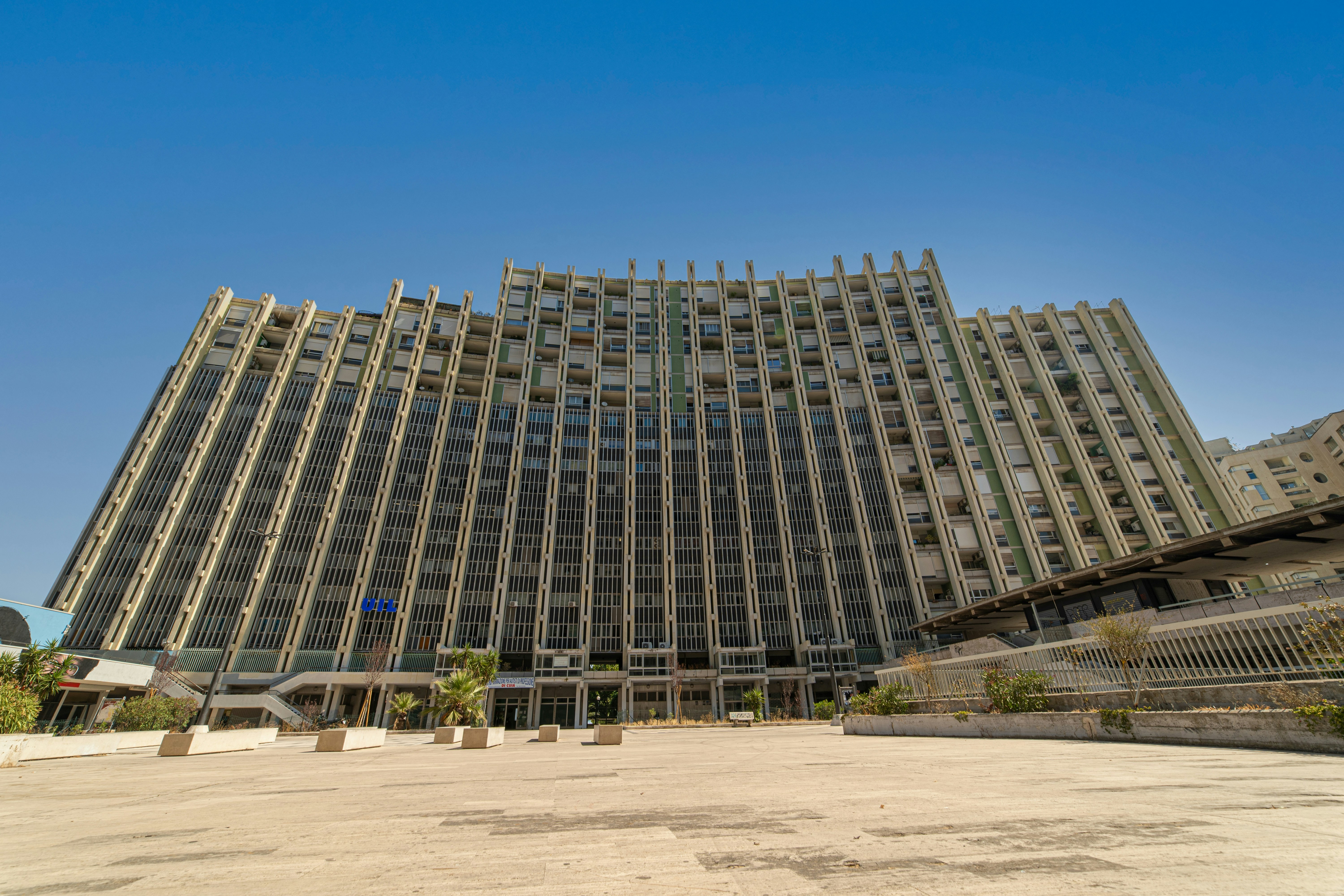 white and blue concrete building during daytime