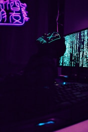 silhouette of person wearing hat