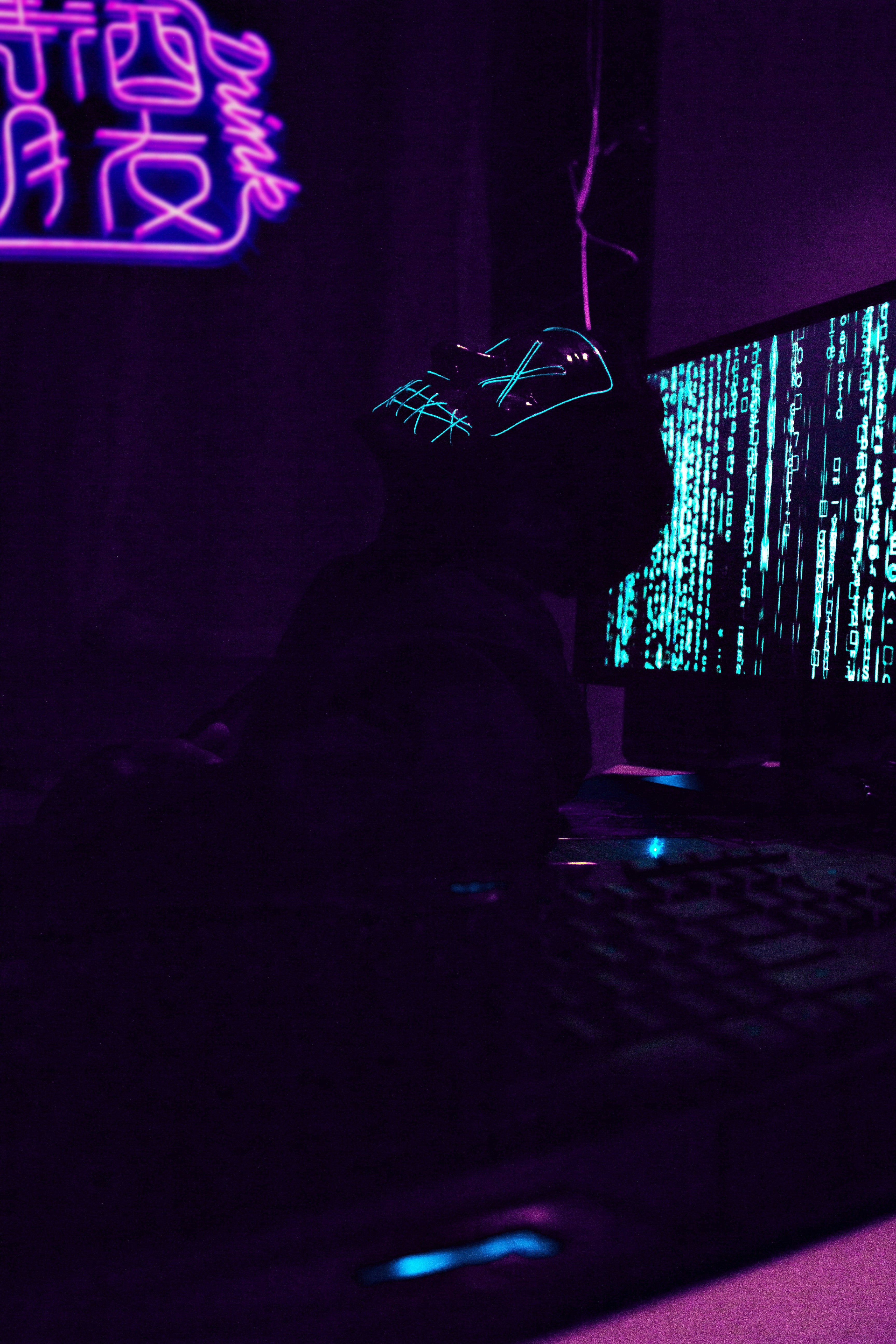 silhouette of person wearing hat