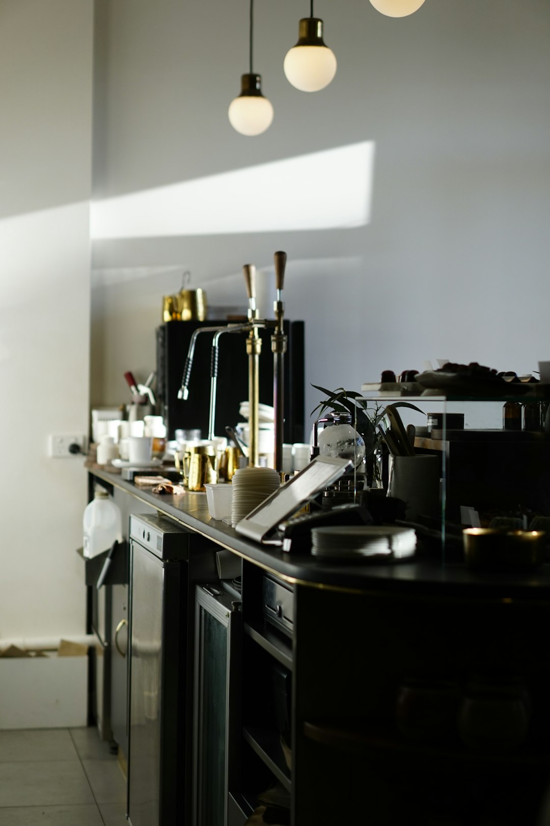 black wooden table with stainless steel faucet