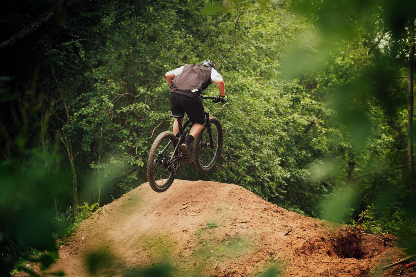 Rider on an unpaved forest road
