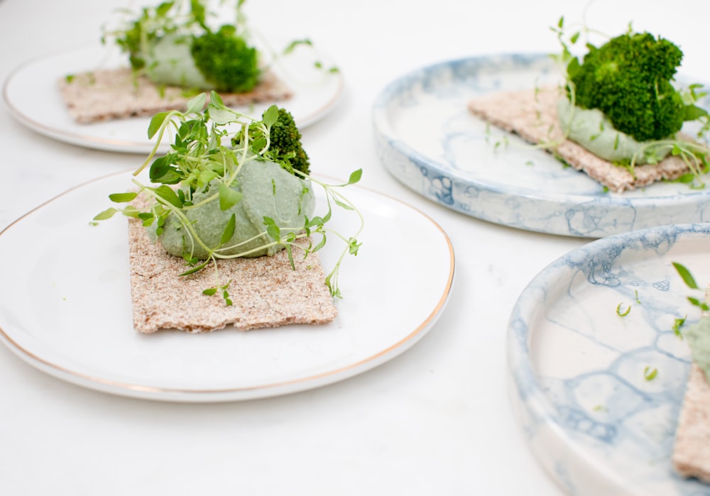 green vegetable on white ceramic plate