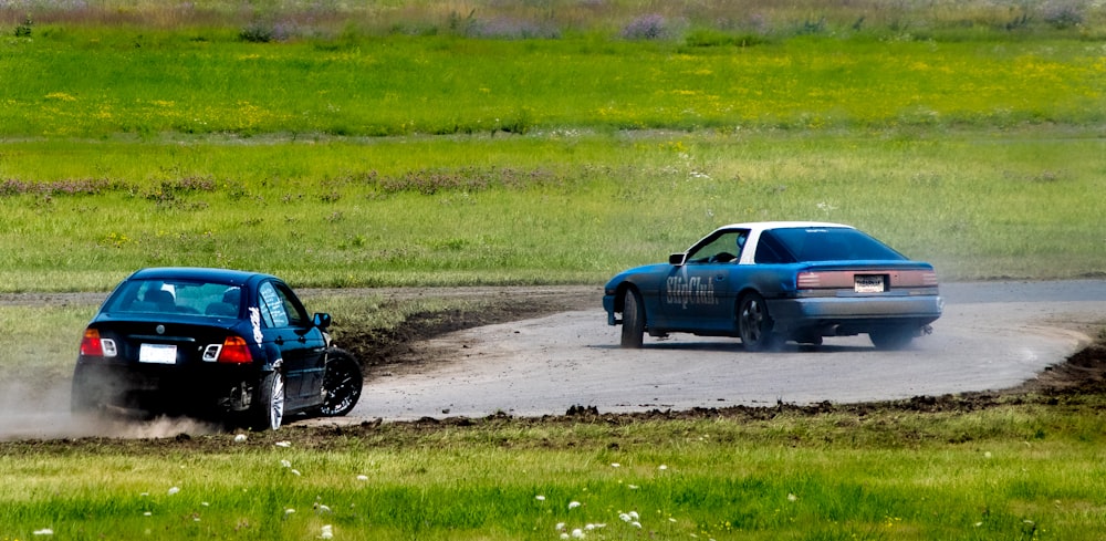 blue car on road during daytime