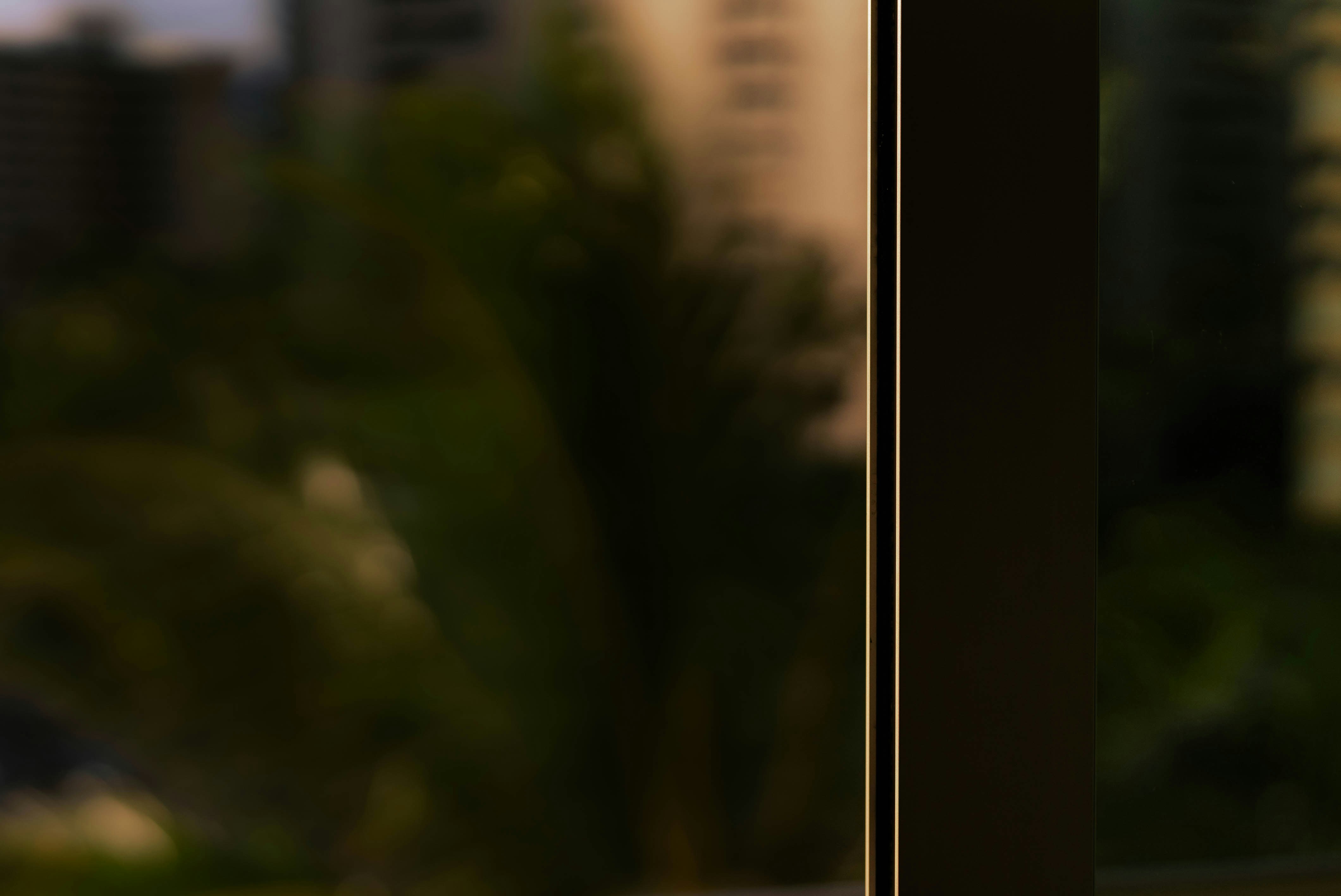 Afternoon light catching the crisp edge of a sliding door on Oahu, Hawaii