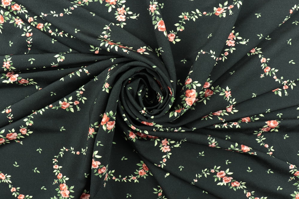 black and red floral textile