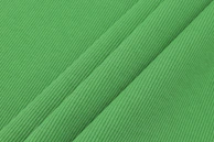 green and white striped textile