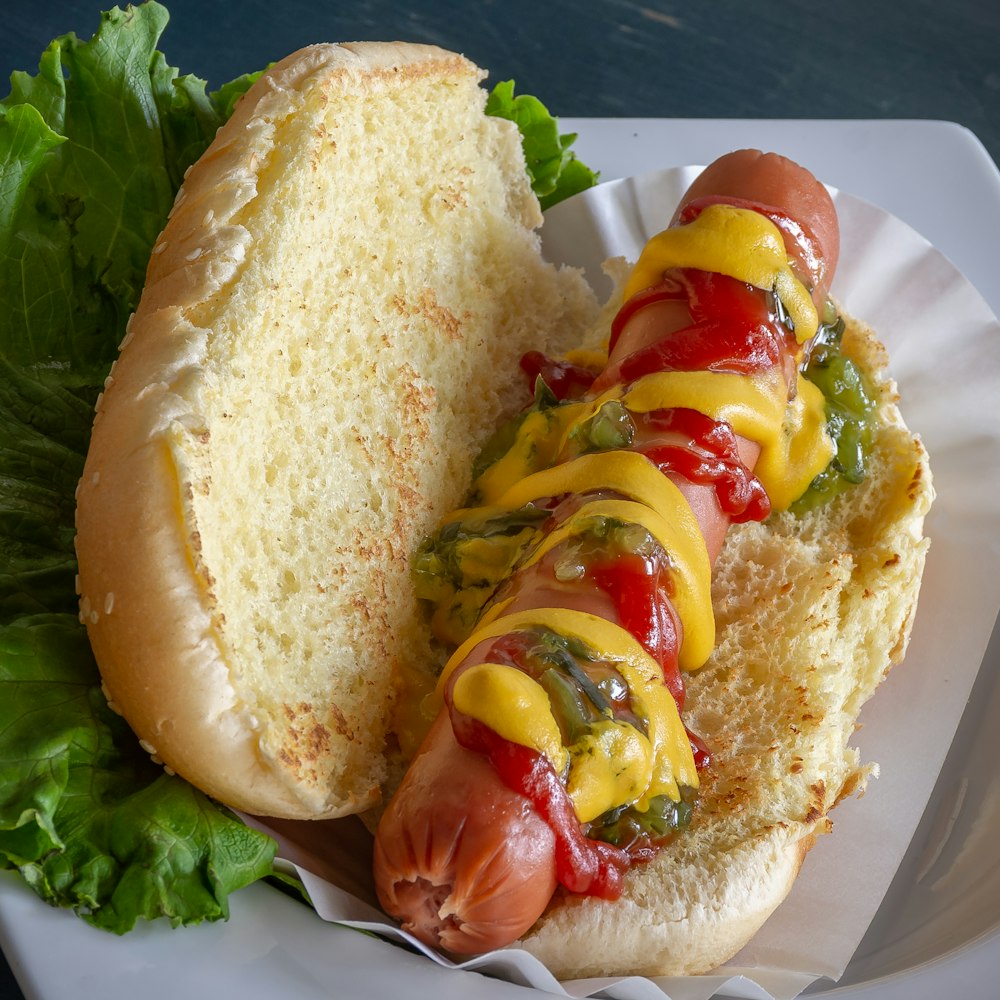 hotdog sandwich with tomato and lettuce